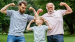 3 generations of men in strong man flex